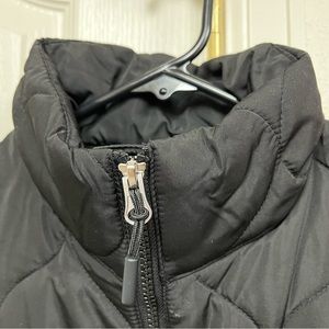 Quilted vest - brand new in sealed package.